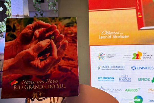 Lançamento de livro sobre reconstrução do RS após as enchentes valoriza ações voluntárias e apoio da AMRIGS-